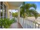 Private balcony overlooking lush tropical landscaping at 423 Bahia Beach Blvd, Ruskin, FL 33570