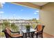 Balcony with marina view, table and chairs for relaxing at 423 Bahia Beach Blvd, Ruskin, FL 33570