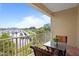 Balcony featuring seating and views of the marina at 423 Bahia Beach Blvd, Ruskin, FL 33570