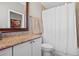 Clean bathroom with granite countertop and white cabinets at 423 Bahia Beach Blvd, Ruskin, FL 33570