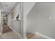 Bright hallway featuring neutral walls and a decorative horse statue on a shelf at 423 Bahia Beach Blvd, Ruskin, FL 33570