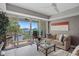 Living area with marina view and balcony access at 423 Bahia Beach Blvd, Ruskin, FL 33570