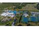 Aerial view of community tennis courts and pool at 4440 Fairways Blvd # 206, Bradenton, FL 34209