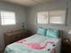 Bedroom with double bed, dresser, and window coverings at 4509 10Th Street E Ct, Ellenton, FL 34222