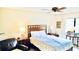 Cozy bedroom with a comfortable bed and plenty of natural light at 4629 Kingsmere # 20, Sarasota, FL 34235