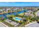 Aerial view of Arbor Reserve community, pool, playground, and lake at 4711 Garden Arbor Way, Bradenton, FL 34203