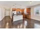 Modern kitchen with stainless steel appliances and an island at 4711 Garden Arbor Way, Bradenton, FL 34203