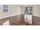 Bright living room with tile floors and sliding glass doors at 4711 Garden Arbor Way, Bradenton, FL 34203