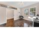 Home office with window seat, desk and ceiling fan at 4711 Garden Arbor Way, Bradenton, FL 34203