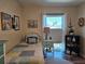 Cozy bedroom decorated with coastal accents has a twin bed with a bright window at 4900 38Th S Way # 201, St Petersburg, FL 33711