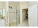 Bathroom with a walk-in shower and glass enclosure at 5118 Chateau Ct, Sarasota, FL 34238