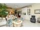 Relaxing living room with comfortable seating and built-in white cabinets at 5118 Chateau Ct, Sarasota, FL 34238