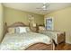 Guest bedroom with two twin beds and ceiling fan at 5250 Hyland Hills Ave # 1525, Sarasota, FL 34241