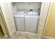 Laundry closet with washer and dryer in a condo unit at 5250 Hyland Hills Ave # 1525, Sarasota, FL 34241