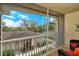 Relaxing screened balcony with wooded views at 5250 Hyland Hills Ave # 1525, Sarasota, FL 34241