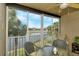 Relaxing screened balcony overlooking the lake and golf course at 5250 Hyland Hills Ave # 1525, Sarasota, FL 34241