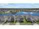 Aerial view of houses near a lake with fountain at 5307 Grove Mill Loop, Lakewood Ranch, FL 34211