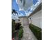 Exterior features a walkway to an ornate gate entrance at 5449 Chanteclaire # 75, Sarasota, FL 34235