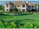 Large clubhouse with golf course and landscaping views at 5452 Club View Ln, North Port, FL 34287