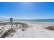 Beach access with white sand and ocean view at 550 De Narvaez Dr, Longboat Key, FL 34228