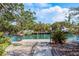 Private dock with access to the waterway at 550 De Narvaez Dr, Longboat Key, FL 34228