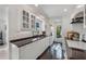 Bright white kitchen with granite countertops and stainless steel appliances at 550 De Narvaez Dr, Longboat Key, FL 34228