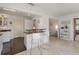 Modern kitchen with white cabinets and granite countertops at 550 De Narvaez Dr, Longboat Key, FL 34228