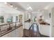 White kitchen with granite countertops and stainless steel appliances at 550 De Narvaez Dr, Longboat Key, FL 34228