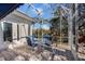 Enjoy this relaxing screened patio, perfect for outdoor dining at 550 De Narvaez Dr, Longboat Key, FL 34228