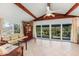 Sunroom boasts water views and comfortable seating at 550 De Narvaez Dr, Longboat Key, FL 34228