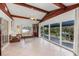 Sunroom features water views and sliding glass doors at 550 De Narvaez Dr, Longboat Key, FL 34228