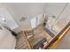 Bright foyer with high ceilings, showcasing hardwood floors and natural light, leading to the home's living spaces at 5616 Mashie Cir, North Port, FL 34287