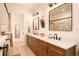 Modern bathroom with double vanity and quartz countertop at 6039 Salt Grass St, Bradenton, FL 34210