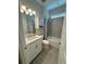 Clean bathroom with tub, shower, and vanity at 649 Maraviya Blvd, Nokomis, FL 34275