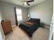 Guest bedroom with full-size bed and plenty of closet space at 649 Maraviya Blvd, Nokomis, FL 34275