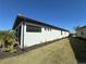 White house exterior with a screened patio at 649 Maraviya Blvd, Nokomis, FL 34275