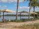 Relaxing patio area with lake views and shaded seating at 649 Maraviya Blvd, Nokomis, FL 34275