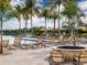 Relaxing pool area with lounge chairs and palm trees at 649 Maraviya Blvd, Nokomis, FL 34275