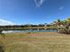 Community lakefront view with homes at 649 Maraviya Blvd, Nokomis, FL 34275