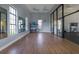 Yoga and stretching area with wood floors and mirrors at 649 Maraviya Blvd, Nokomis, FL 34275