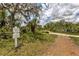 Nature trail entrance with signage in a residential community at 6841 74Th Street E Cir, Bradenton, FL 34203