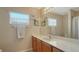 Bathroom with vanity, mirror and shower at 6920 74Th Street E Cir, Bradenton, FL 34203