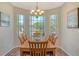 Bright dining room with hardwood floors and bay window at 6920 74Th Street E Cir, Bradenton, FL 34203