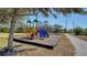 Colorful playground with slides and swings at 6920 74Th Street E Cir, Bradenton, FL 34203