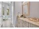 Elegant bathroom boasting a granite countertop and modern fixtures at 6939 Bee Ridge Rd, Sarasota, FL 34241