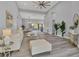 Bright and airy living room with hardwood floors and open floor plan at 6939 Bee Ridge Rd, Sarasota, FL 34241