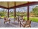 Private screened porch overlooks a lush green backyard at 6939 Bee Ridge Rd, Sarasota, FL 34241