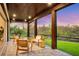 Relaxing screened porch with wooden ceiling and comfortable seating at 6939 Bee Ridge Rd, Sarasota, FL 34241