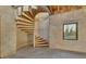 Unique spiral staircase in unfinished basement area at 6939 Bee Ridge Rd, Sarasota, FL 34241