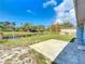 Large fenced backyard with a view, perfect for outdoor activities and relaxation at 712 N Elm St, Englewood, FL 34223